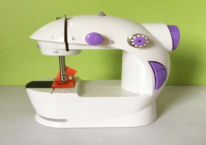 迷你缝纫机袖珍4合一多功能手持便携式缝纫