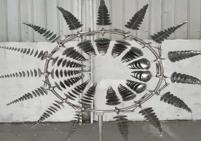 风能动态风车制作厂家_不锈钢抽象艺术雕塑_风动摆件