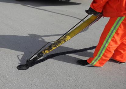 路面修补材料沥青灌缝胶 适用于不同气温 供应道路裂缝灌缝胶 晟飞