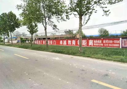 江苏南京墙体广告,工程机械墙体喷绘广告,墙体挂布广告