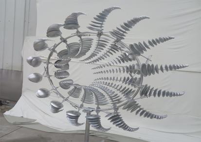 风能动态风车制作厂家_不锈钢抽象艺术雕塑_风动摆件